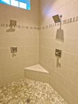 Invigorating Roman Shower in Downstairs Master Bathroom